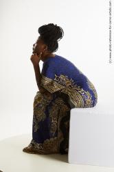 Dina Moses African Woman Sitting Pose